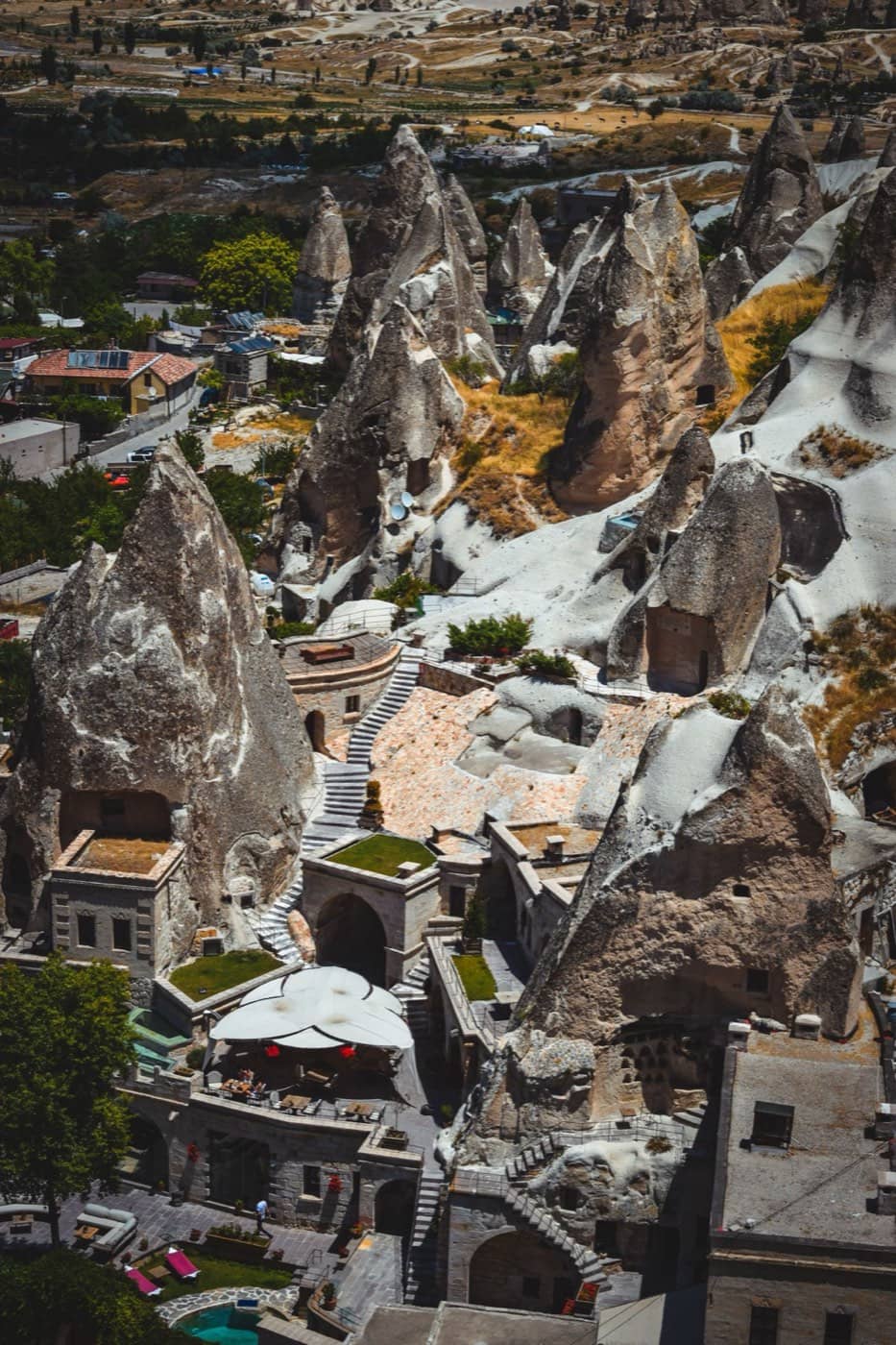 Cave hotels carved into the rock above Göreme at sunrise