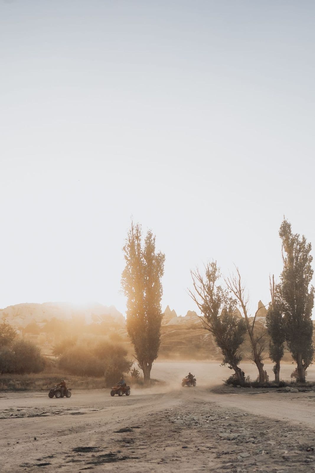 ATV riders in Rose Valley at sunset